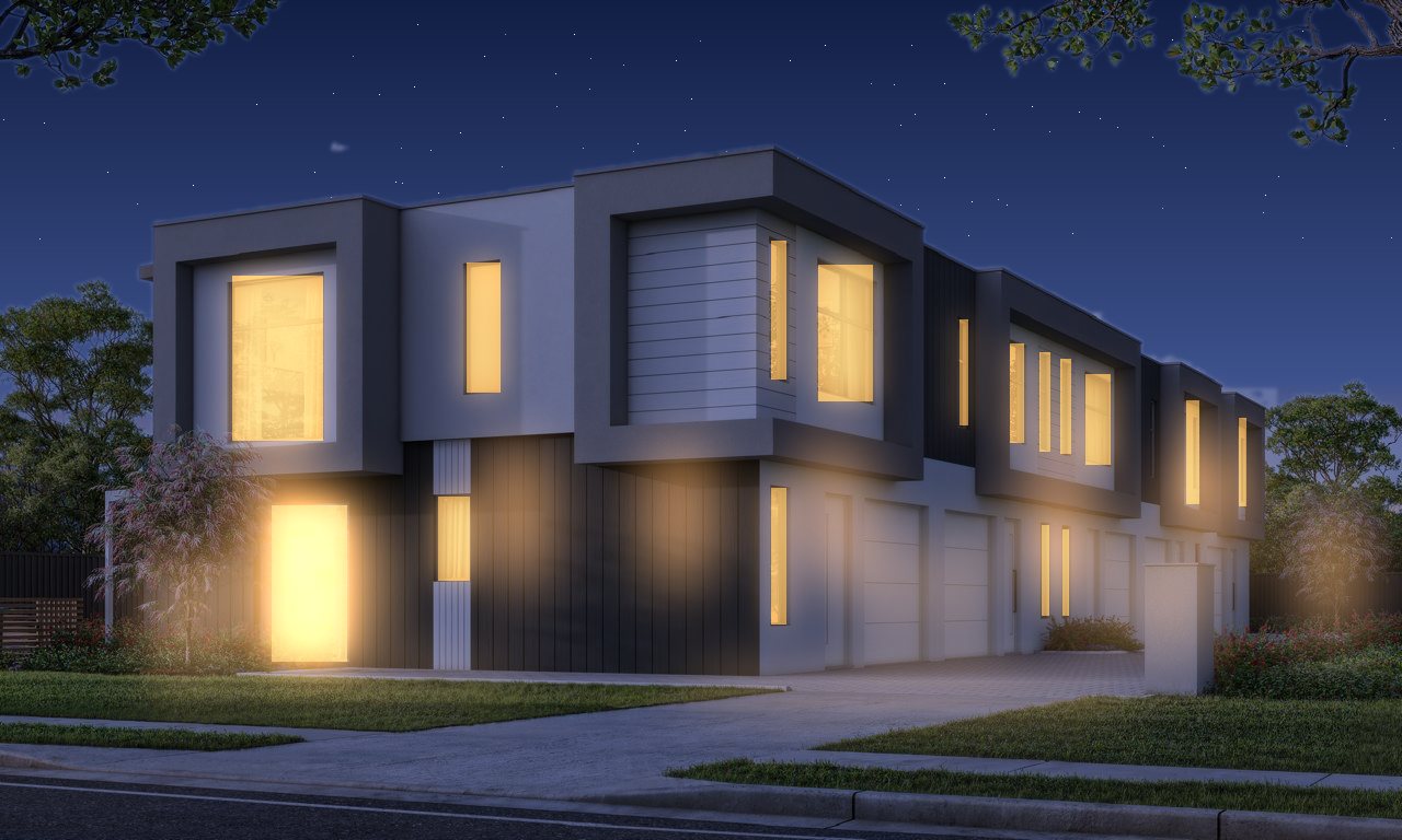 The same view at night, with the windows lit.
